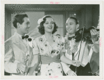 Amusements - Performers and Personalities - Musicians - Promotional photograph for "Hawaiian Nights" Johnny Downs, Constance Moore and Matty Malneck