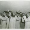 Amusements - Performers and Personalities - Musicians - Men playing trumpet and woman