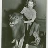 Amusements - Performers and Personalities - Musicians - Mercer, Ruby - With lion