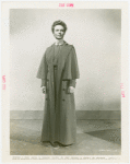 Amusements - Performers and Personalities - Musicians - Neagle, Anna - In trench coat