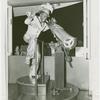 Amusements - Performers and Personalities - Robinson, Bill - In costume, peering through telescope