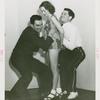Amusements - Performers and Personalities - Showgirls - Men trying to lift girl