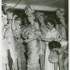 Amusements - Performers and Personalities - Showgirls - Getting into costumes