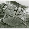 Amusements - Shows and Attractions - Aerial Acts and Airshows - Parachute Jumper getting into plane