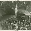 Amusements - Shows and Attractions - Aerial Acts and Airshows - Men standing on airplane
