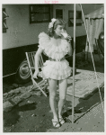 Amusements - Shows and Attractions - Aerial Acts and Airshows - Vess, Ginger - Drinking milk