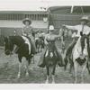 Amusements - Shows and Attractions - Cavalcade of Centaurs - Cowboy and two boys on horseback