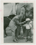 Amusements - Shows and Attractions - Frank Buck's Jungleland - Elephants - Frank Buck and boy