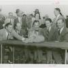 Amusements - Shows and Attractions - Frank Buck's Jungleland - Lions and Tigers - Johnny Weissmuller, Grover Whalen, Frank Buck and others with baby lion