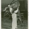 Amusements - Shows and Attractions - Frank Buck's Jungleland - Lions and Tigers - Frank Phillips hugging lion