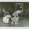 Amusements - Shows and Attractions - Frank Buck's Jungleland - Monkeys and Chimpanzees - Monkeys in costume pushing each other in wheelbarrow