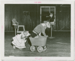 Amusements - Shows and Attractions - Frank Buck's Jungleland - Monkeys and Chimpanzees - Monkeys in costume pushing each other in wheelbarrow