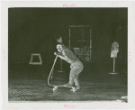 Amusements - Shows and Attractions - Frank Buck's Jungleland - Monkeys and Chimpanzees - Monkey in costume on scooter