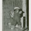 Amusements - Shows and Attractions - Frank Buck's Jungleland - Monkeys and Chimpanzees - Chimpanzee in costume with beer bottle