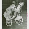 Amusements - Shows and Attractions - Frank Buck's Jungleland - Monkeys and Chimpanzees - Monkeys in costumes on tricycles