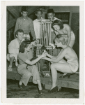 Amusements - Shows and Attractions - Frank Buck's Jungleland - Monkeys and Chimpanzees - Monkey with showgirls
