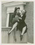 Amusements - Villages - Gay New Orleans - Two woman sitting on fence
