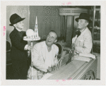 Amusements - Villages - Little Miracle Town - Morris Guest with man and midget holding model