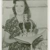 Amusements - Villages - Merrie England - Woman holding replica of Crown Jewels