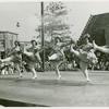 Amusements - Villages - Old New York - Showgirls kicking in air