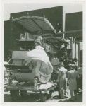 Amusements - Villages - Old New York - Girl in costume alighting horse bus