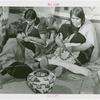 Amusements - Villages - Seminole Village - Indian women weaving baskets with child