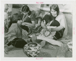 Amusements - Villages - Seminole Village - Indian women weaving baskets with child