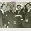 Apparel and Accessories Exhibit - Grover Whalen and industry leaders with check