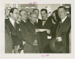 Apparel and Accessories Exhibit - Grover Whalen and industry leaders with check
