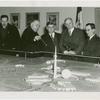 Arkansas Participation - Arkansas delegation with Dennis Nolan viewing Fair model