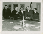 Arkansas Participation - Arkansas delegation with Dennis Nolan viewing Fair model