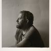 Man in a t-shirt (Gene Thornton).