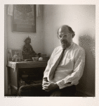 Allen Ginsberg at his altar. New York, NY.