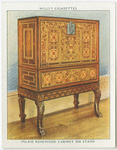 Inlaid rosewood cabinet on stand.