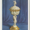 Carved ivory cup with jewelled mounts.