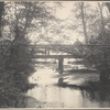 Two men standing on a footbridge in Cold Spring Harbor, L.I.