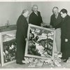 Art Exhibits - American Art Today - Committee members opening box of submissions