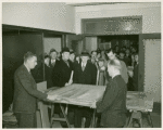 Art Exhibits - American Art Today - Men looking at painting
