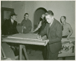 Art Exhibits - American Art Today - Man signing painting