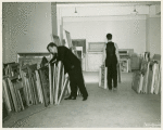 Art Exhibits - American Art Today - Men in room with painting submissions