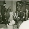 Art Exhibits - American Art Today - Men in room with sculpture submissions