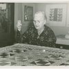Art Exhibits - American Art Today - Woman sewing quilt