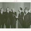 Australia Participation - L.R. MacGregor (Commissioner) presents copy of Australian constitution for exhibit