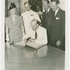 Australia Participation - L.R. MacGregor (Commissioner) signing guest register at Perylon Hall