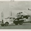 Automobiles - Death Dodgers - Car jumping over truck