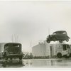 Automobiles - Death Dodgers - Car jumping over milk trucks