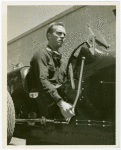 Automobiles - Grand Prix - Man at wheel of Bugatti car