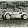 Automobiles - Grand Prix - Man driving an MG