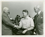 Automobiles - Grand Prix - Harvey Gibson and Ralph DePalma congratulating winner