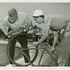 Automobiles - Model - Men using bicycle to start model car